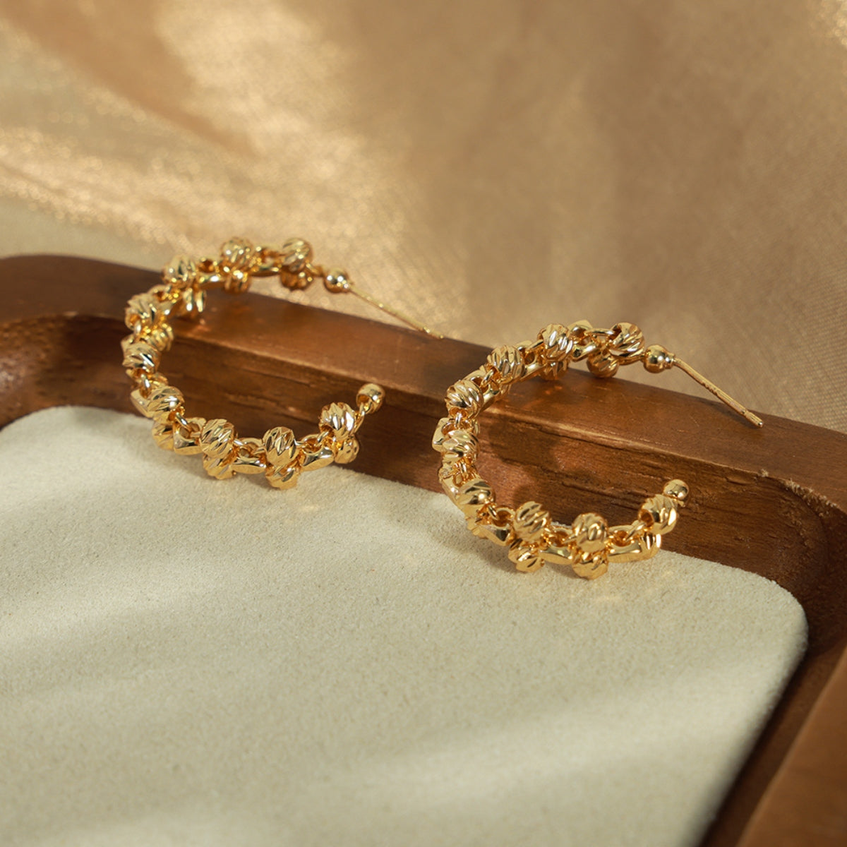 earringsAdd a touch of timeless sophistication to your jewelry collection with these classic gold-plated hoop earrings. Crafted from high-quality titanium steel and finishedRahaa Earrings