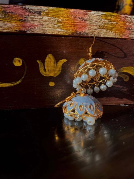 Introducing Roohi Jhumki: Elegance in Every Detail
Handcrafted Perfection
Roohi Jhumki is a strikingly beautiful pair of earrings featuring handcrafted pearls at theRoohi Jhumki