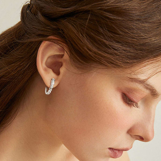 earringsEmbrace the elegance of traditional Indian jewelry with these stunning moissanite stud earrings, beautifully designed to capture timeless charm and grace. Crafted wiUma Earrings