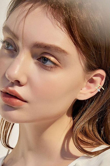 earringsIntroducing the Nidhi Cuff Earrings — a sleek, minimalist design that exudes understated elegance. These earrings are crafted from premium 925 sterling silver, plateNidhi Cuff Earrings