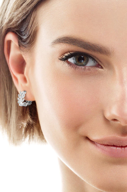 earringsIntroducing the Phool Earrings — a beautiful blend of minimalist design and timeless charm. These earrings feature delicate Moissanite stones set in 925 sterling silPhool Earrings